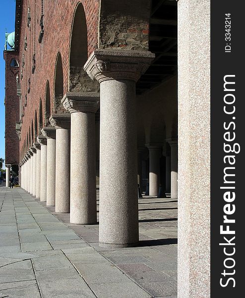 Pillars at an entrance to a giant beautiful building. Pillars at an entrance to a giant beautiful building