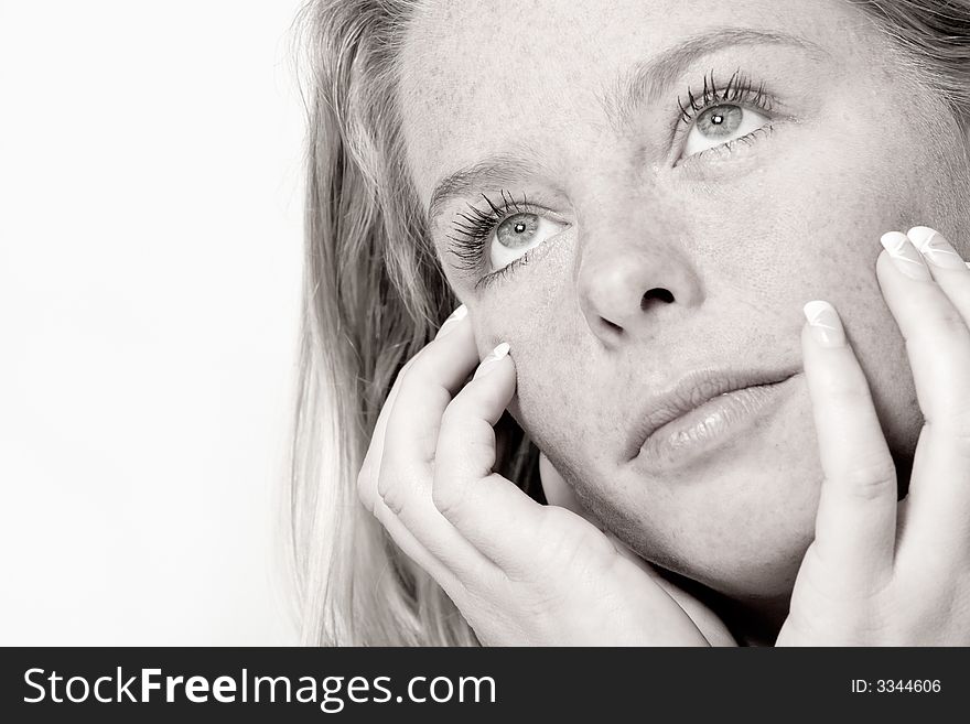 Blond woman in the studio on a white background doing the welness shoot. Blond woman in the studio on a white background doing the welness shoot