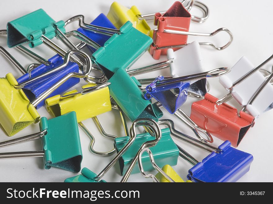 Assorted colored steel paper clips.