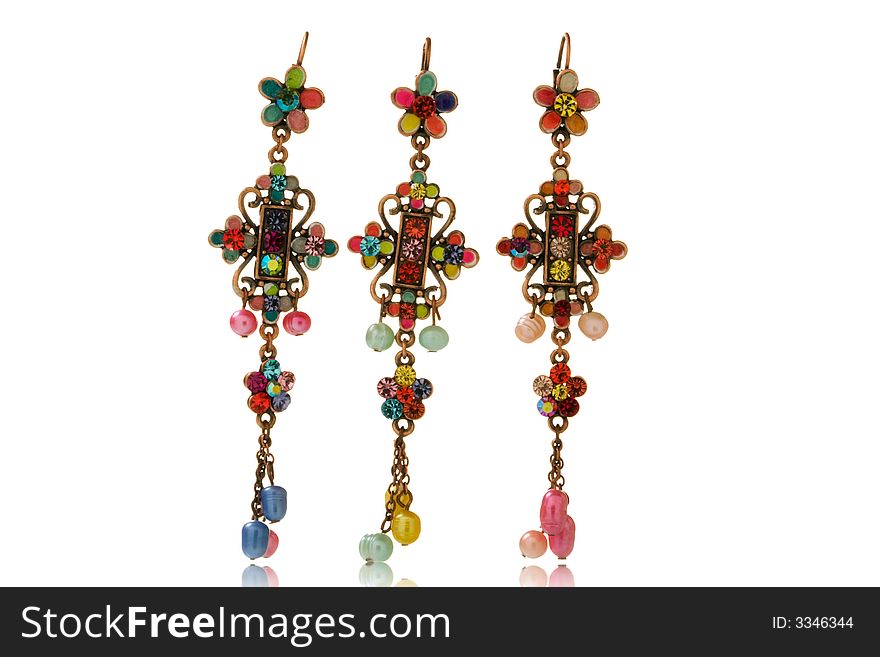 Colorful earrings isolated over white background
