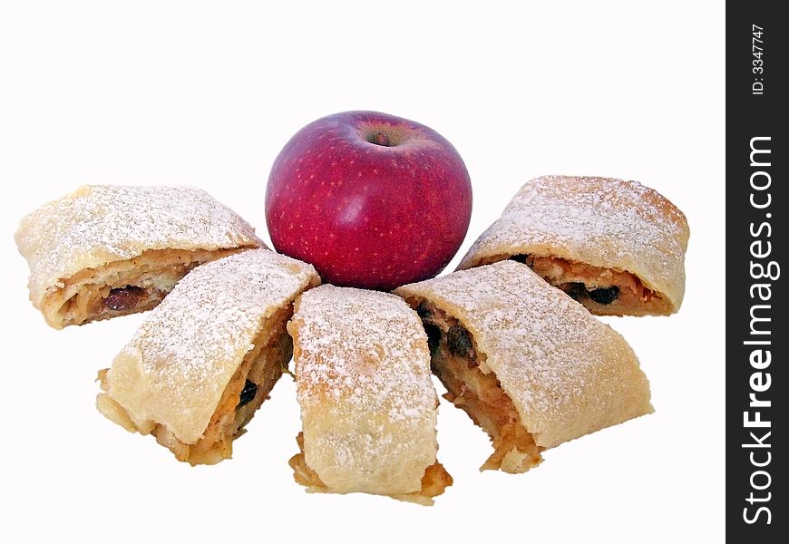 A strudel with apples, cinnamon, raisins and lemon.