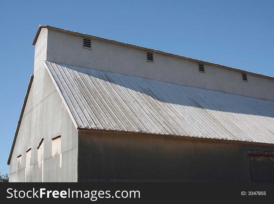 A Peanut Processing Plant against a blue sky