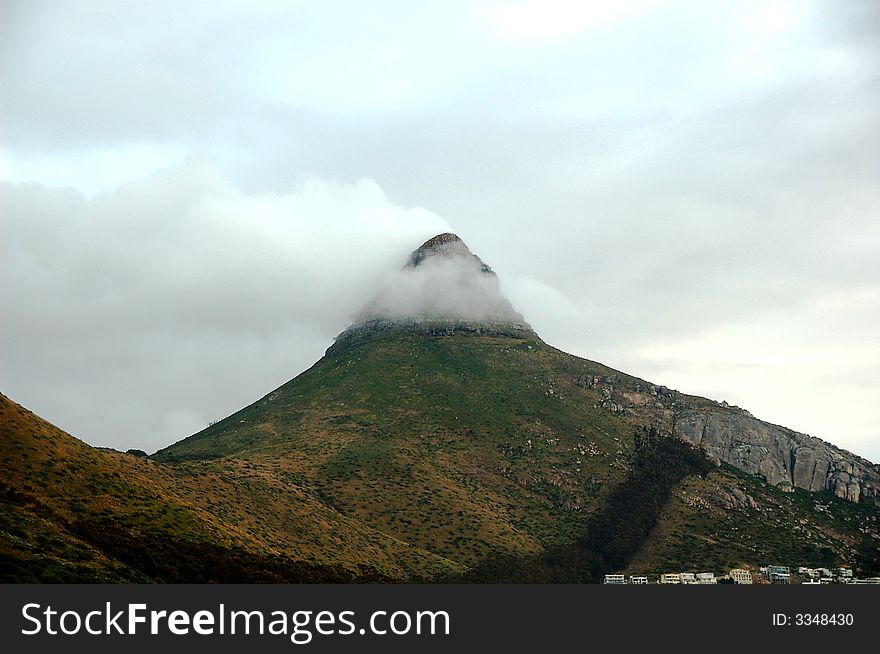 Mountain Peak In Clouds