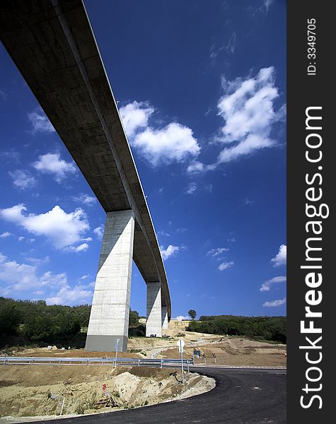 Monumental viaduct against blue sky