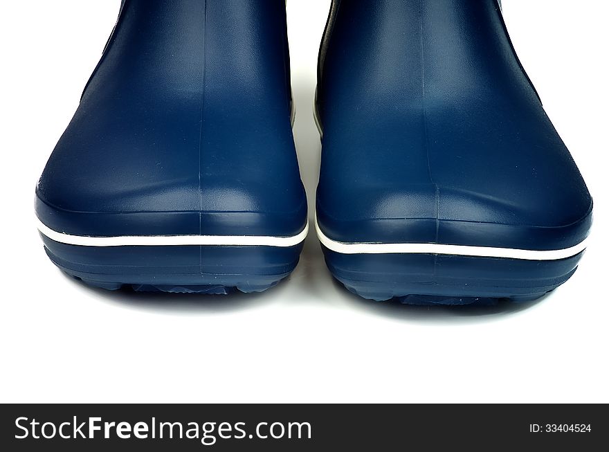 Noses of Contemporary Dark Blue Rubber Boots closeup on white background