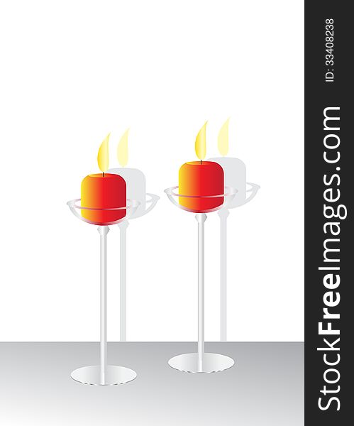 Two candles. Glass candle holders and two red candles