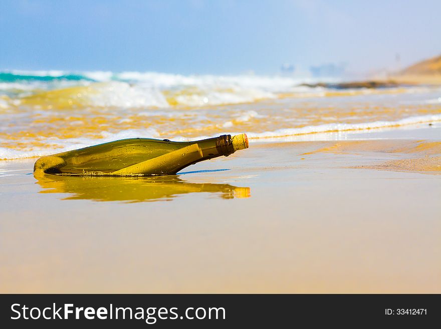 Adventures,bottle on the shore of sea