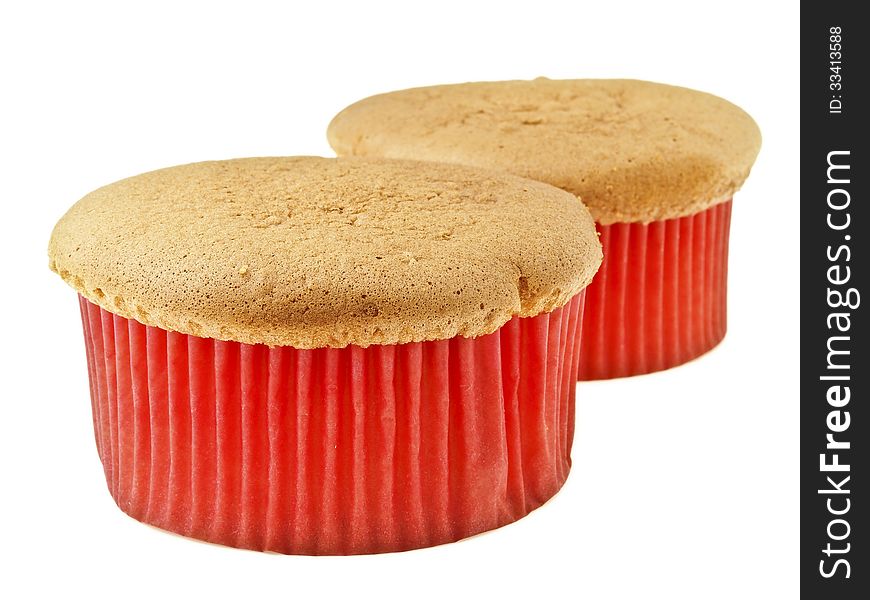 Row of two sponge cake in red paper cup on white background. Row of two sponge cake in red paper cup on white background
