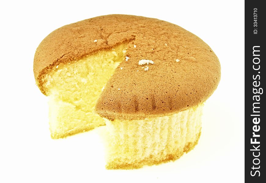 Most of sponge cake after area segment cut on white background
