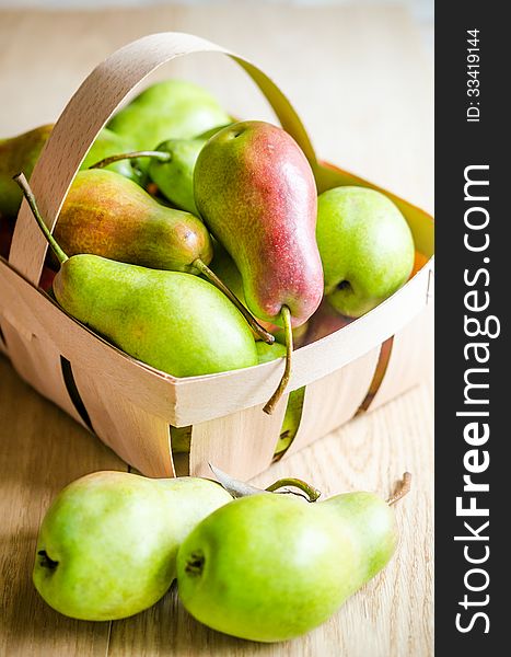 Green pears in the basket