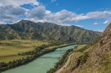 Turquoise River Mountains Sky Royalty Free Stock Photography Turquoise River Mountains Sky Royalty Free Stock Photography