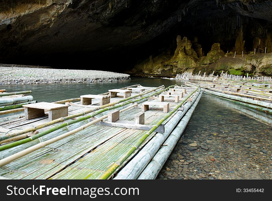 Small bamboo raft use to travel in the cave