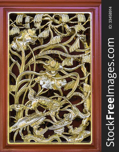 Traditional ancient chinese decorative wood craft with gold leaf window frame. Traditional ancient chinese decorative wood craft with gold leaf window frame