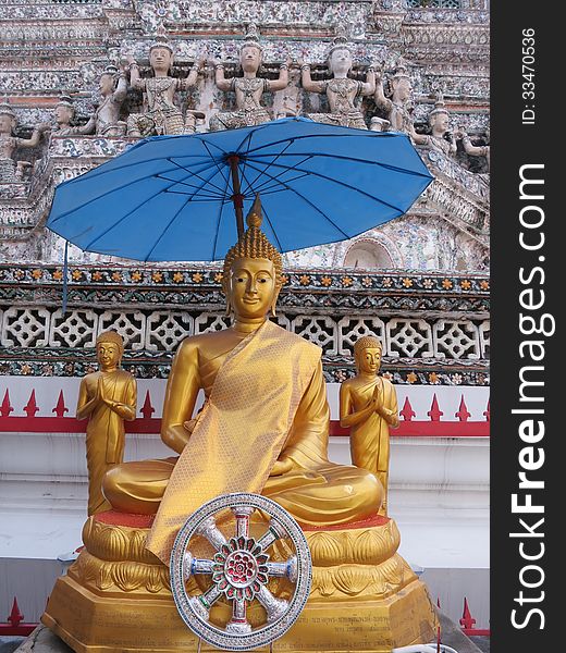 The Buddha Statue Under The Umbrella