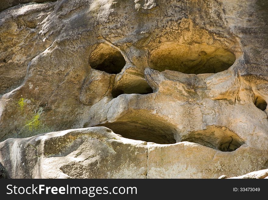 Rock in the shape of the head. Rock in the shape of the head