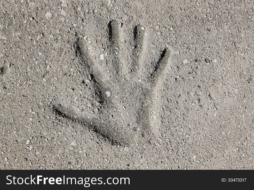 Imprint of a hand in concrete. Imprint of a hand in concrete