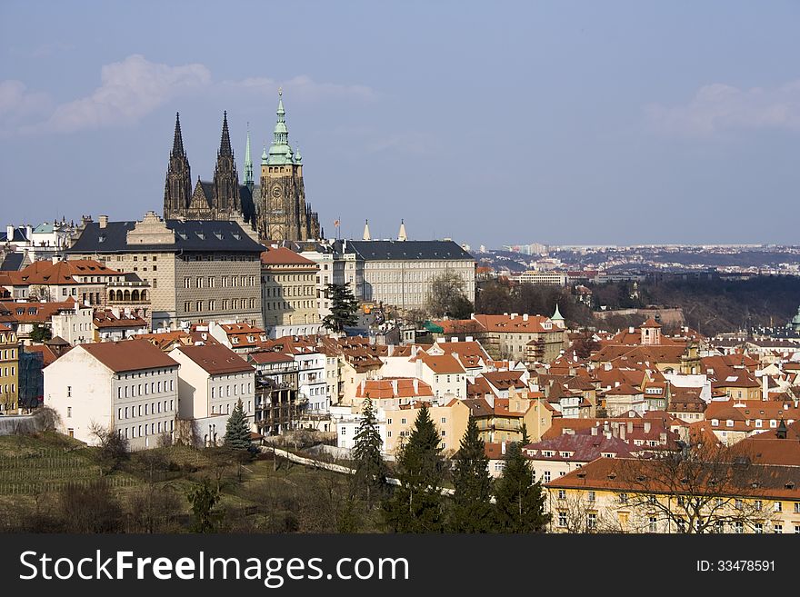 Red roofs of prague and prague castle