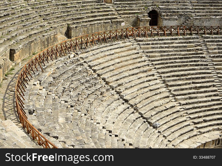 Amphitheater in ancient city Hierapolis. Pamukkale, Turkey. Amphitheater in ancient city Hierapolis. Pamukkale, Turkey.