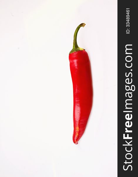 Red hot peppers on white background