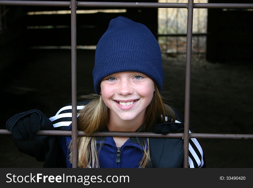 Smiling young girl in old building