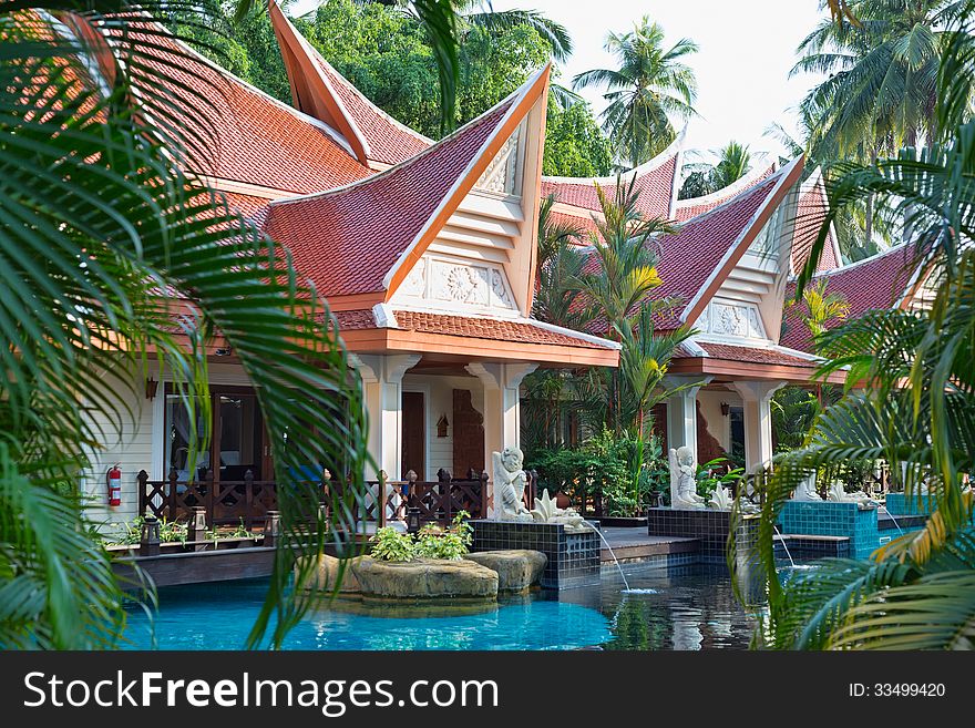 Tropical resort hotel swimming pool.