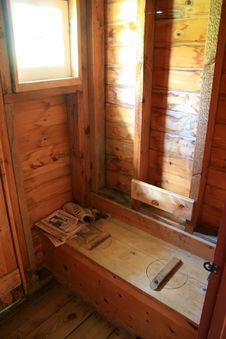 Indoor Outhouse Stock Images