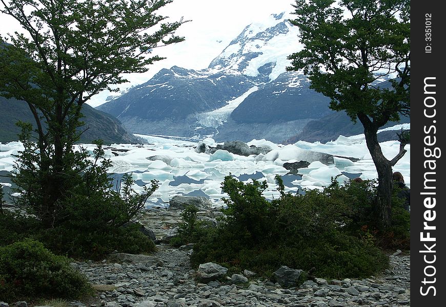 Ice breaking down from the perito moreno glacier in Patagonia floating on lake. Ice breaking down from the perito moreno glacier in Patagonia floating on lake