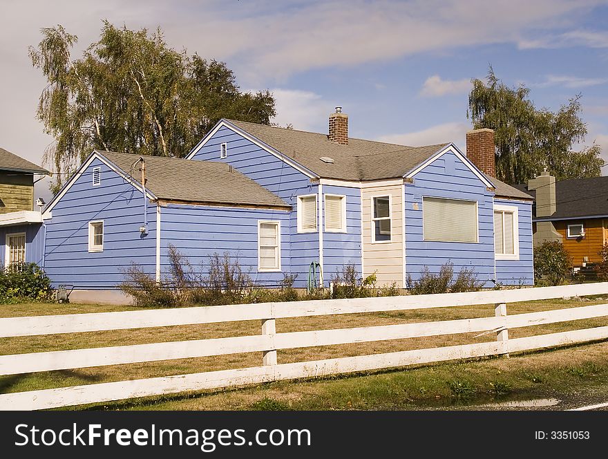 Blue House White Fence