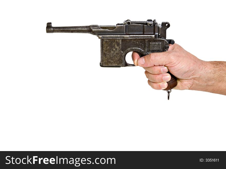 Old Mauser German Pistol in a hand on white background. Old Mauser German Pistol in a hand on white background