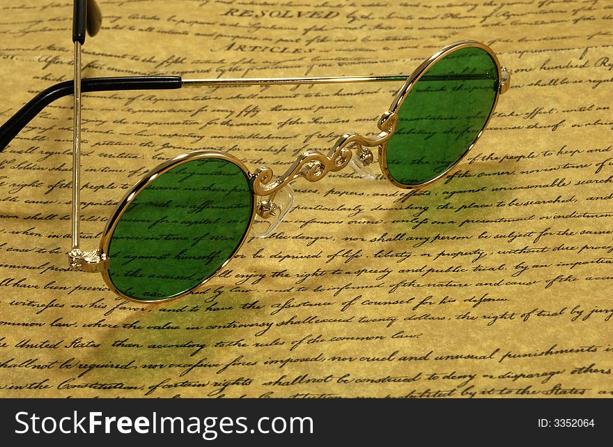 Photo of VIntage Eyeglasses on a Parchment