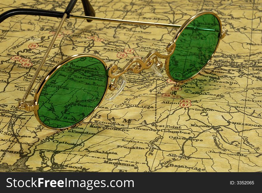Photo of a Vintage Map and Vintage Eyeglasses