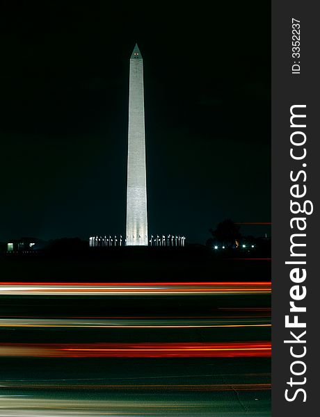 Night shot of the washington monument in washington D.C. - foreground with motion blurred traffic