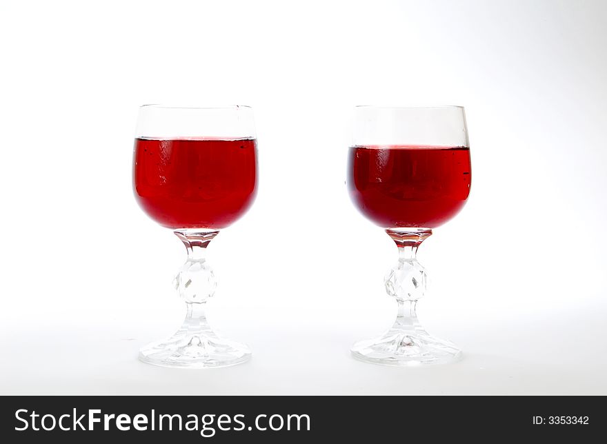 An image of bottle of wine and wine glasses. An image of bottle of wine and wine glasses