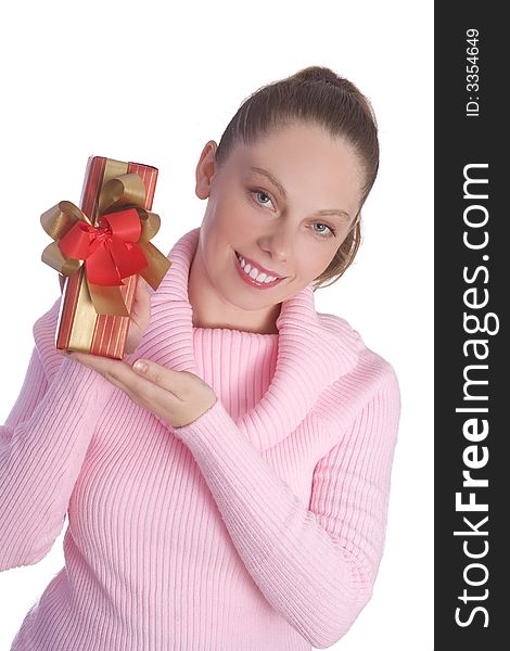 Beautiful young girl in pink holding red gift isolated on white background. Beautiful young girl in pink holding red gift isolated on white background