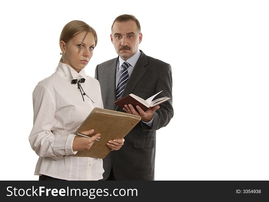Serious man and a woman in office with document on the white background. Serious man and a woman in office with document on the white background