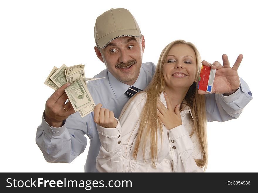 A man in cap with credit cards and money is hugging a smiling woman. A man in cap with credit cards and money is hugging a smiling woman