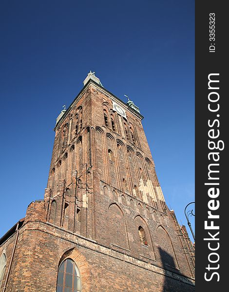 High middleages church tower in the sky