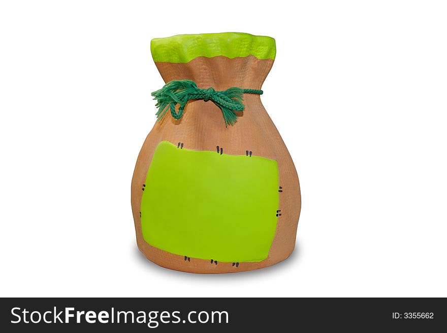 Isolated ceramic money box with green patch