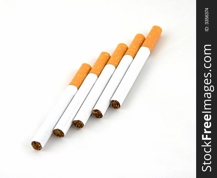 The cigarettes which photographed on a white background and have been laid out obliquely