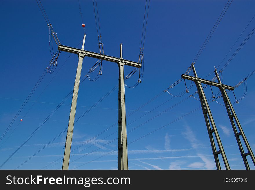 Electrical power lines in sky