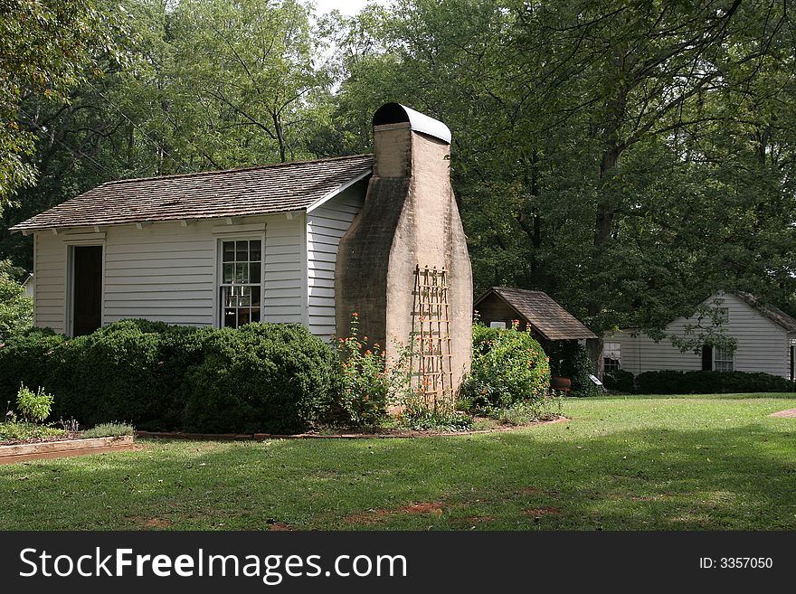 An old farmhouse in a rural setting. An old farmhouse in a rural setting