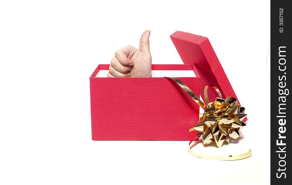 Raised thumb coming out of a red gift box. Raised thumb coming out of a red gift box