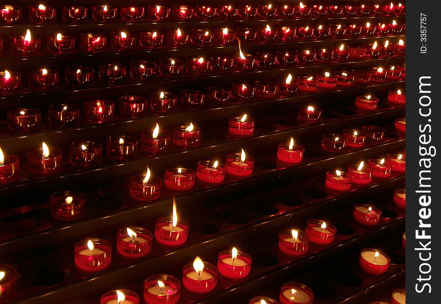 Rows of candles in church. Rows of candles in church