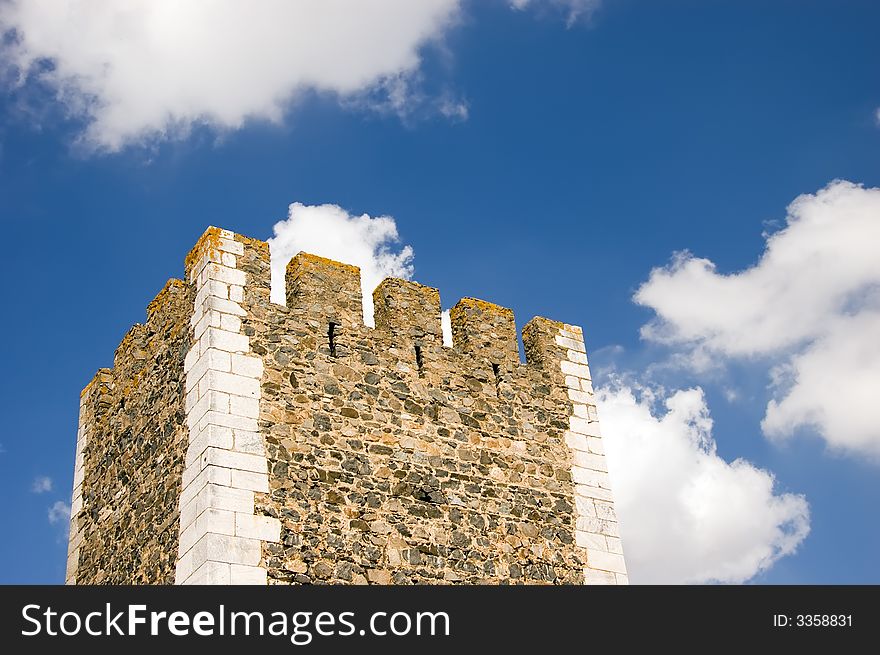 Castle tower under a beautiful blue sky