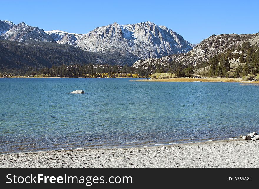 Mountain lake in California's Sierra Nevada on bright, cloudless day