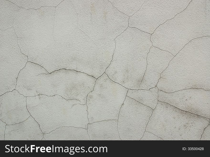Detail of cracked grunge white wall. Detail of cracked grunge white wall