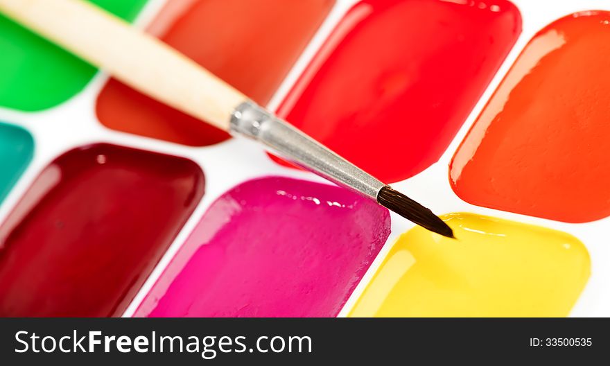 School box of paints and brush macro