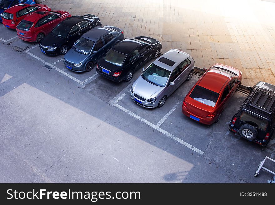 Many cars in underground parking lot. Many cars in underground parking lot