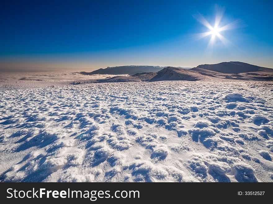 Sun and snow mountains landscape. See my other works in portfolio.