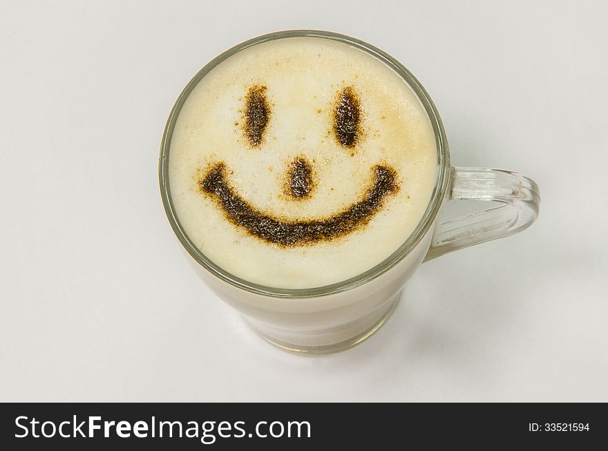 A cup of coffee with smiley. A cup of coffee with smiley.